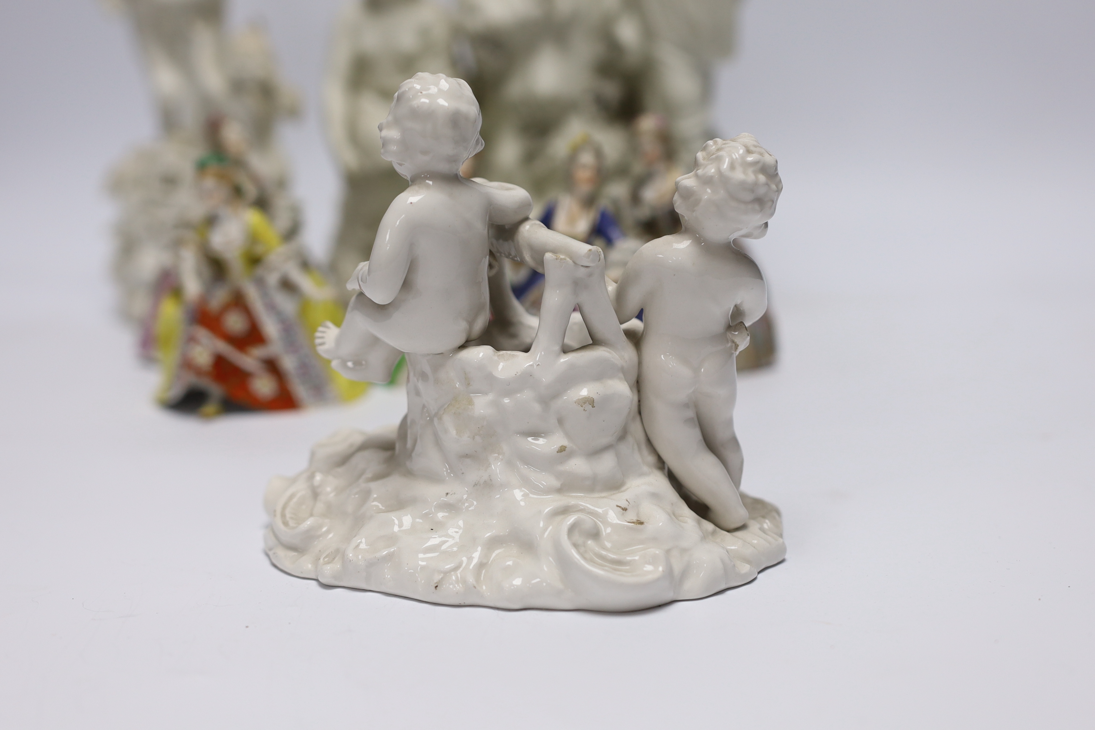 Two late 18th century biscuit figural centrepieces, six figurines and another, tallest 40cm
